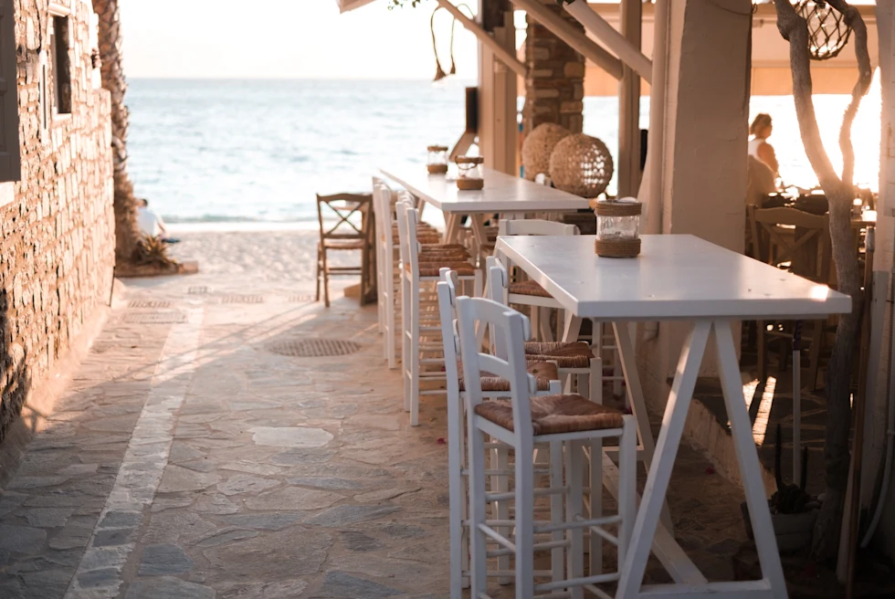 A few wooden tables in Naxos, Greece.