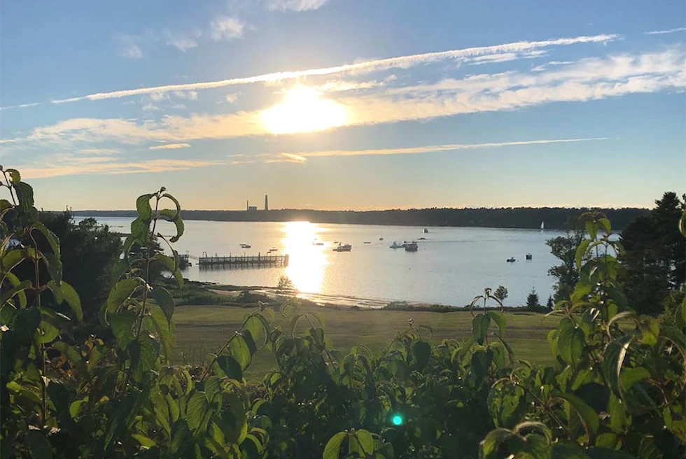 body of water during sunset