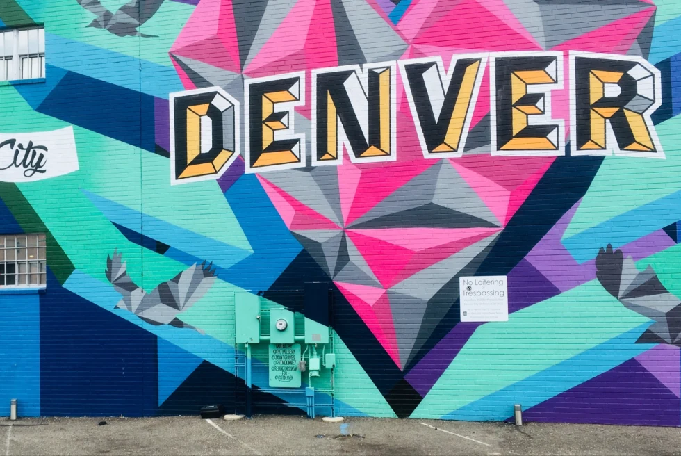 colorful wall mural that reads "Denver"
