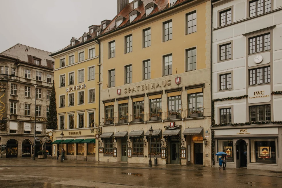 Streets and neutral buildings in Munich on a gloomy and rainy day.