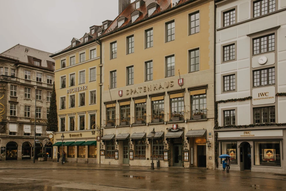 Streets and neutral buildings in Munich on a gloomy and rainy day.