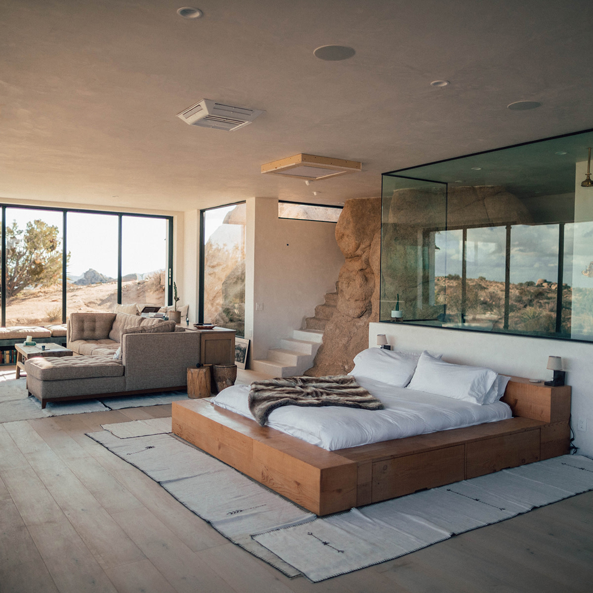 bedroom in the desert in a hotel room with muted natural colors