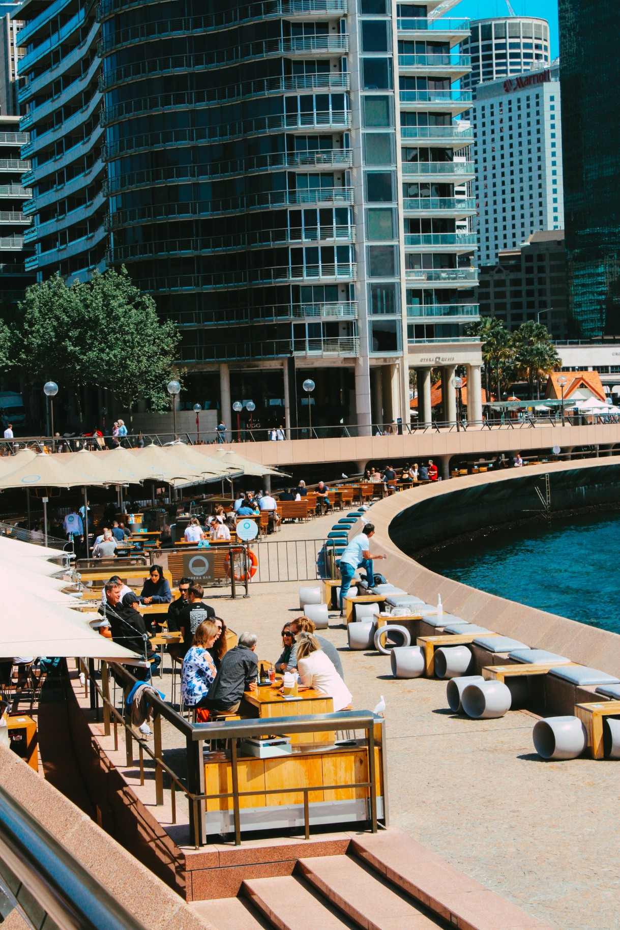 People eating on the bay in Sydney. 