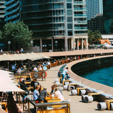 People eating on the bay in Sydney. 