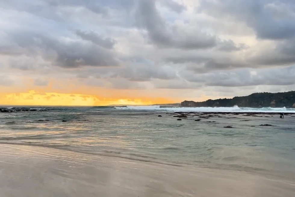 view of a beach during sunset
