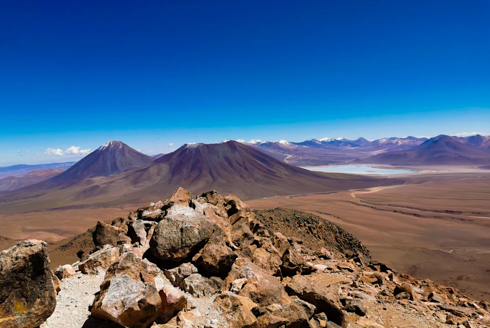 a volcano under blue sky