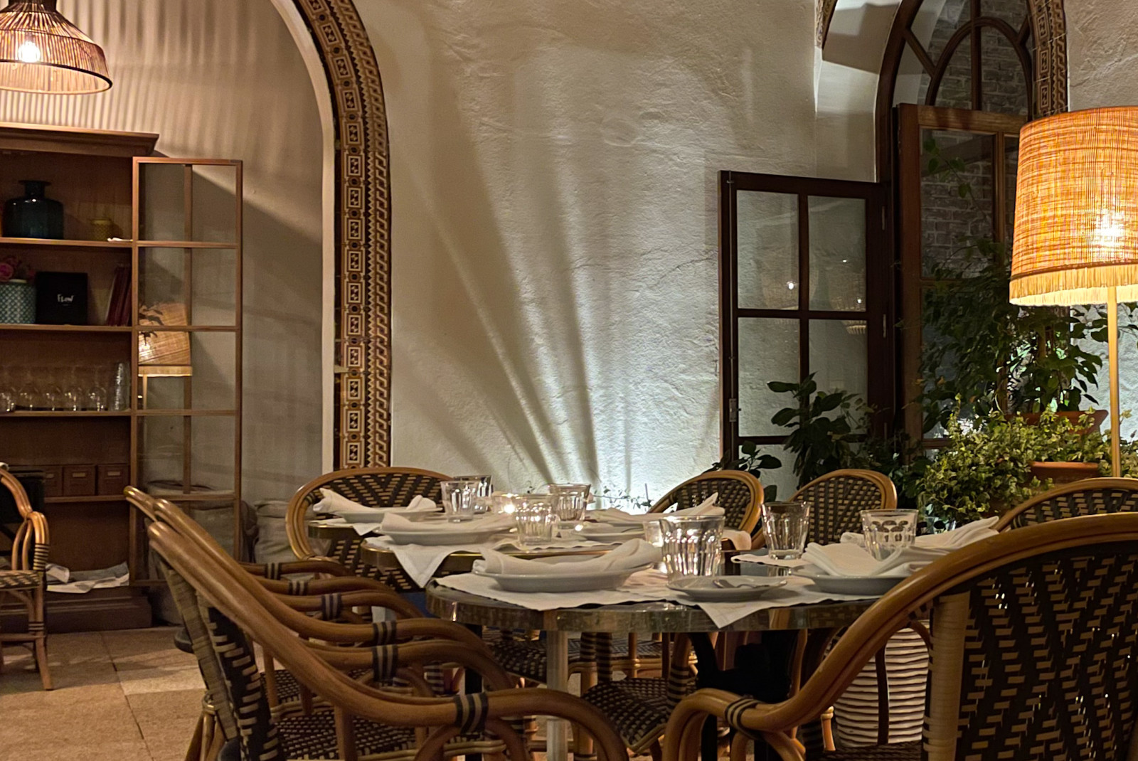 table and chairs in a warmly lit room