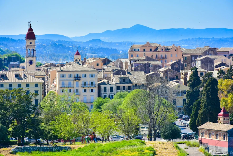 historic island village with mountain range