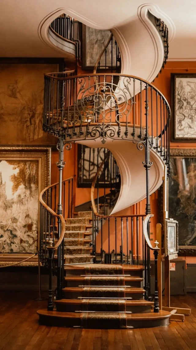brown-spiral-staircase-with-brown-steel-railings