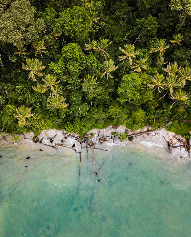 Aerial view of Las Catalinas Costa Rica with Blue Water and Green palm Trees