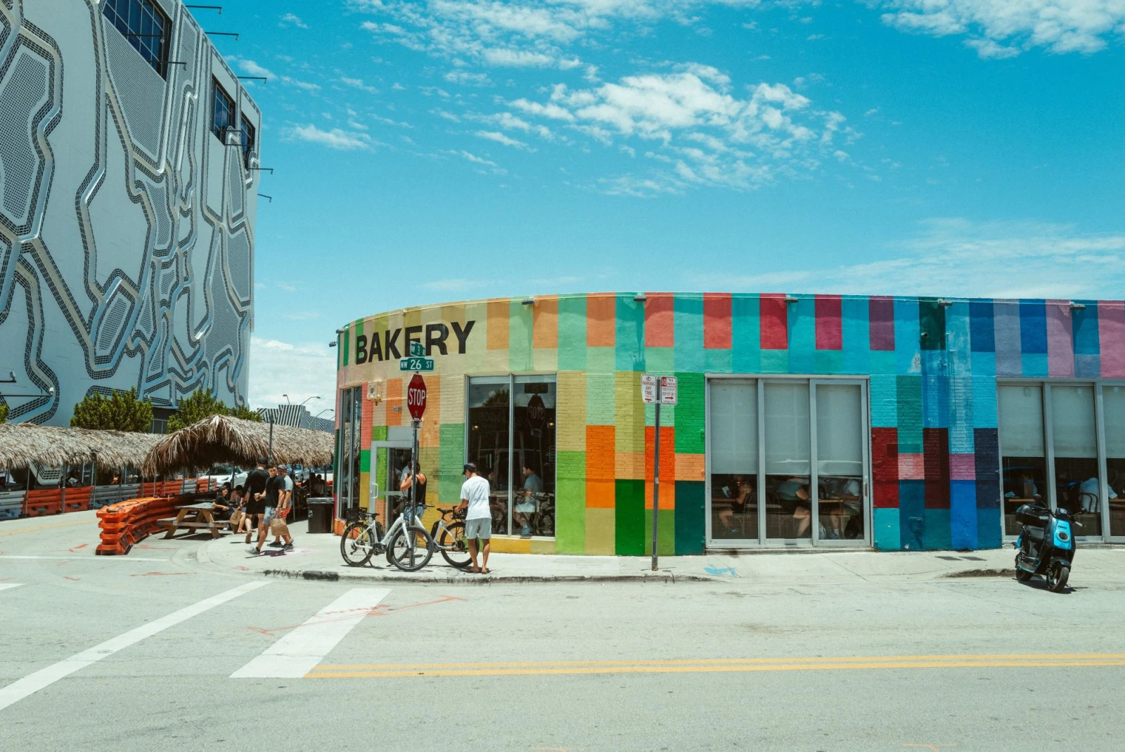 colorful hand painted building reads, "bakery" on a sunny day
