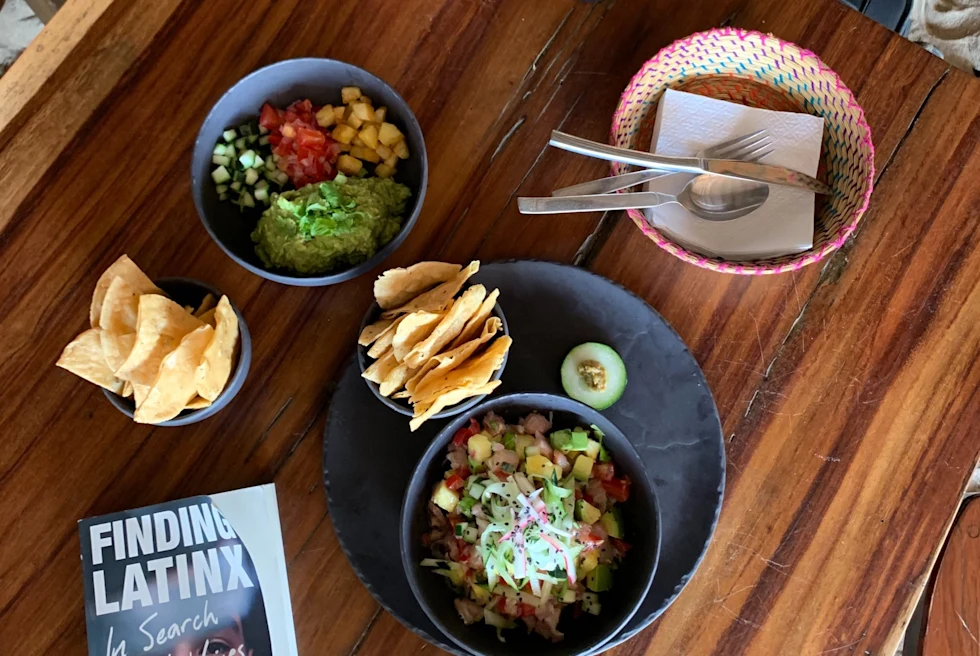 ships and salsa on a table in the sand