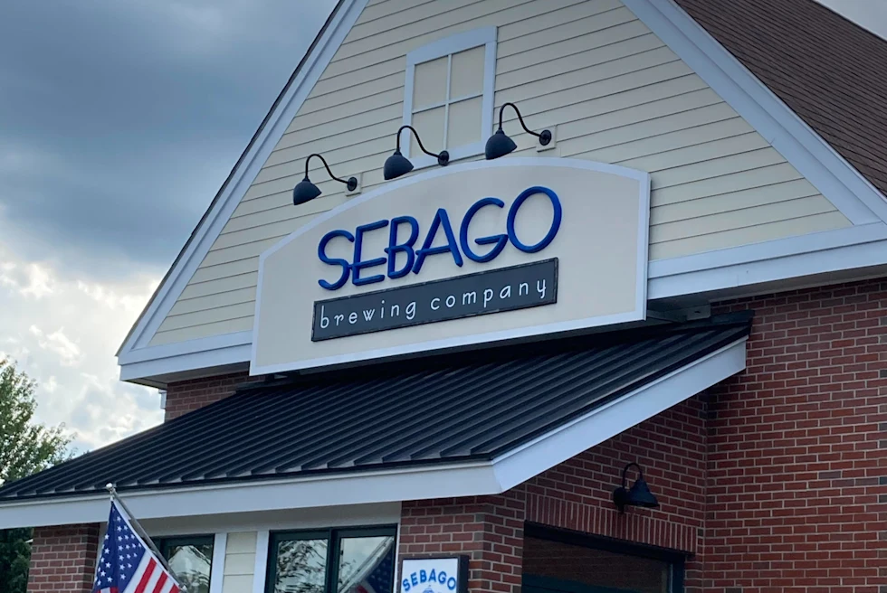 A lobster served on a plate.