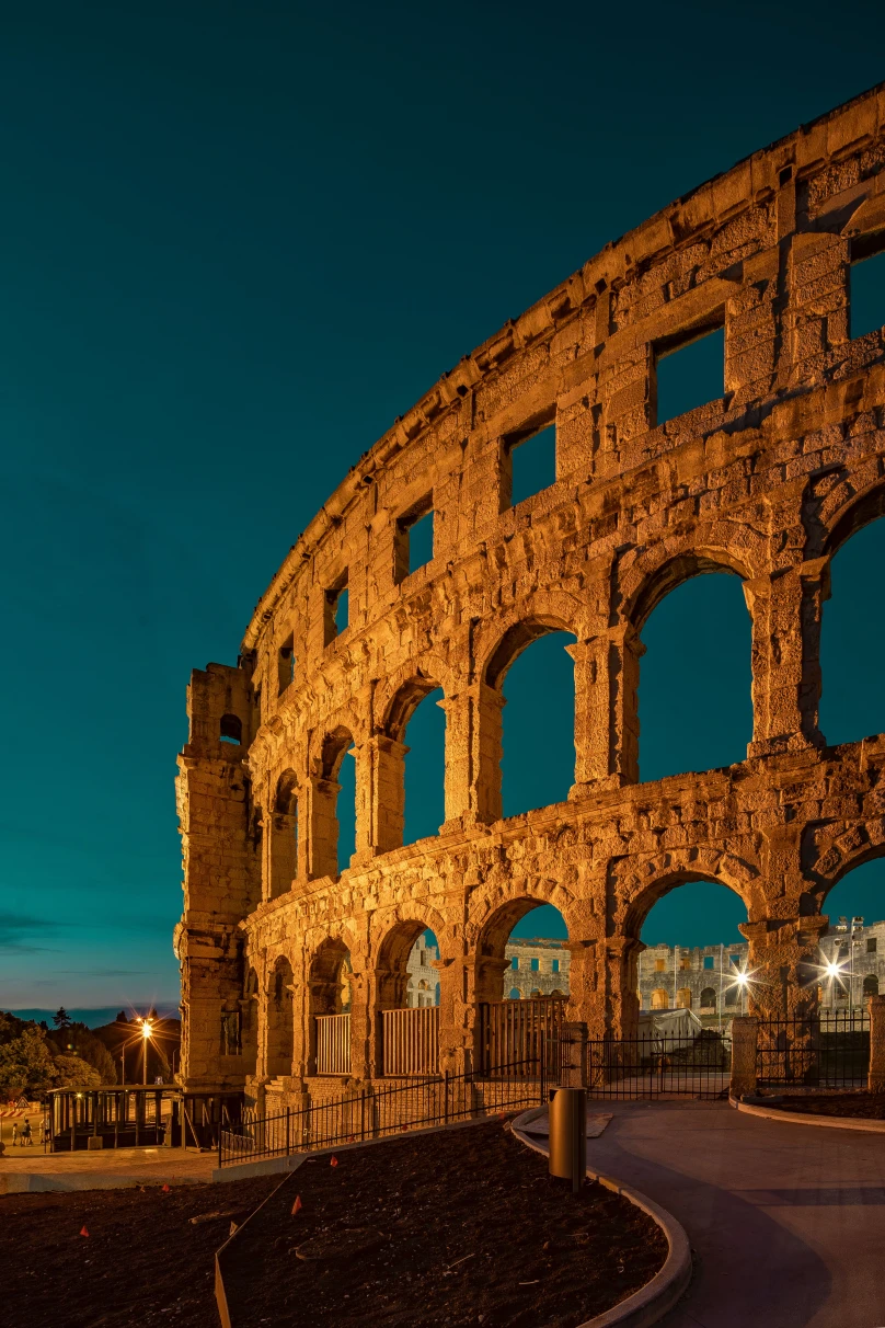 A shot of the Colosseum at night in Rome, Italy. 