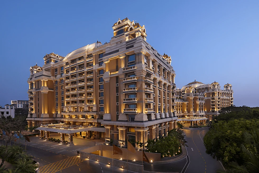 a grand hotel lit up at night