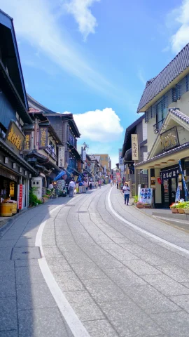 A shopping street with stalls on either side in Narita Japan.