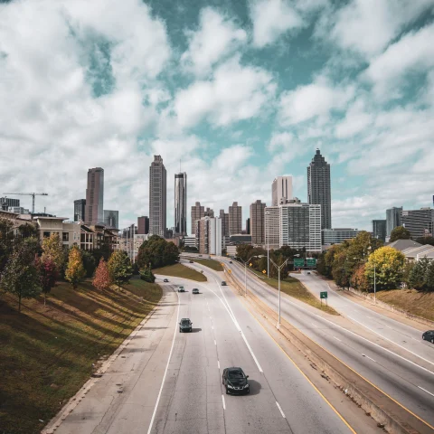 The skyline of Atlanta from a highway.