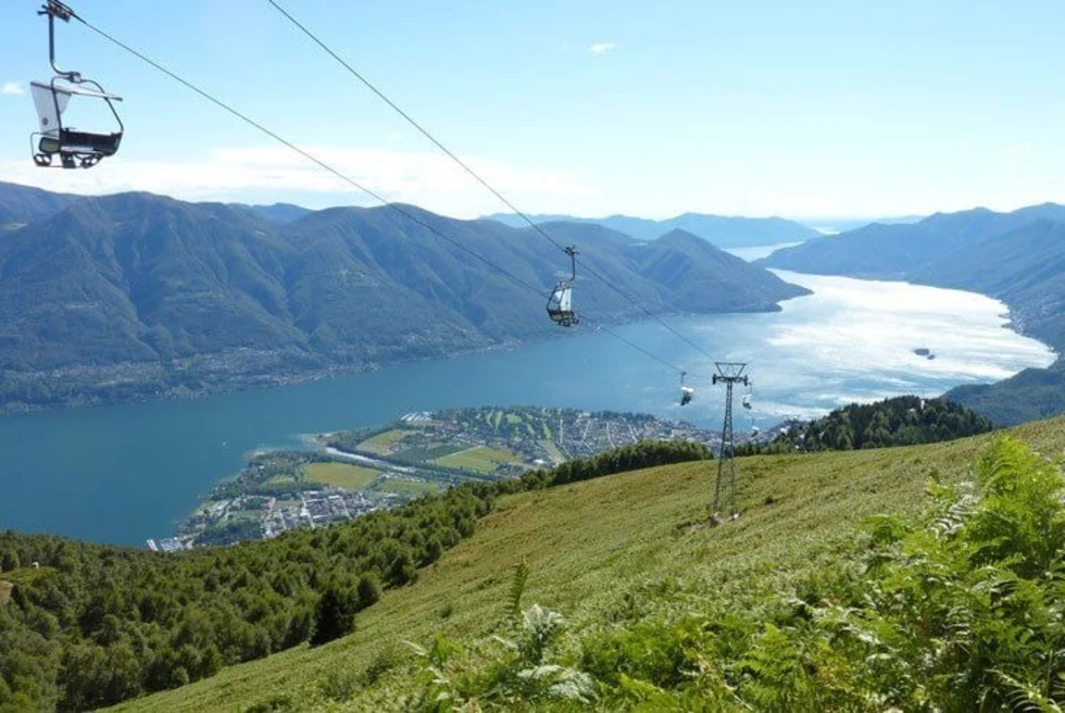 Cardada Cimetta is a scenic mountain paradise in Switzerland, boasting panoramic vistas, hiking trails, and a cable car ride to reach its breathtaking summit.