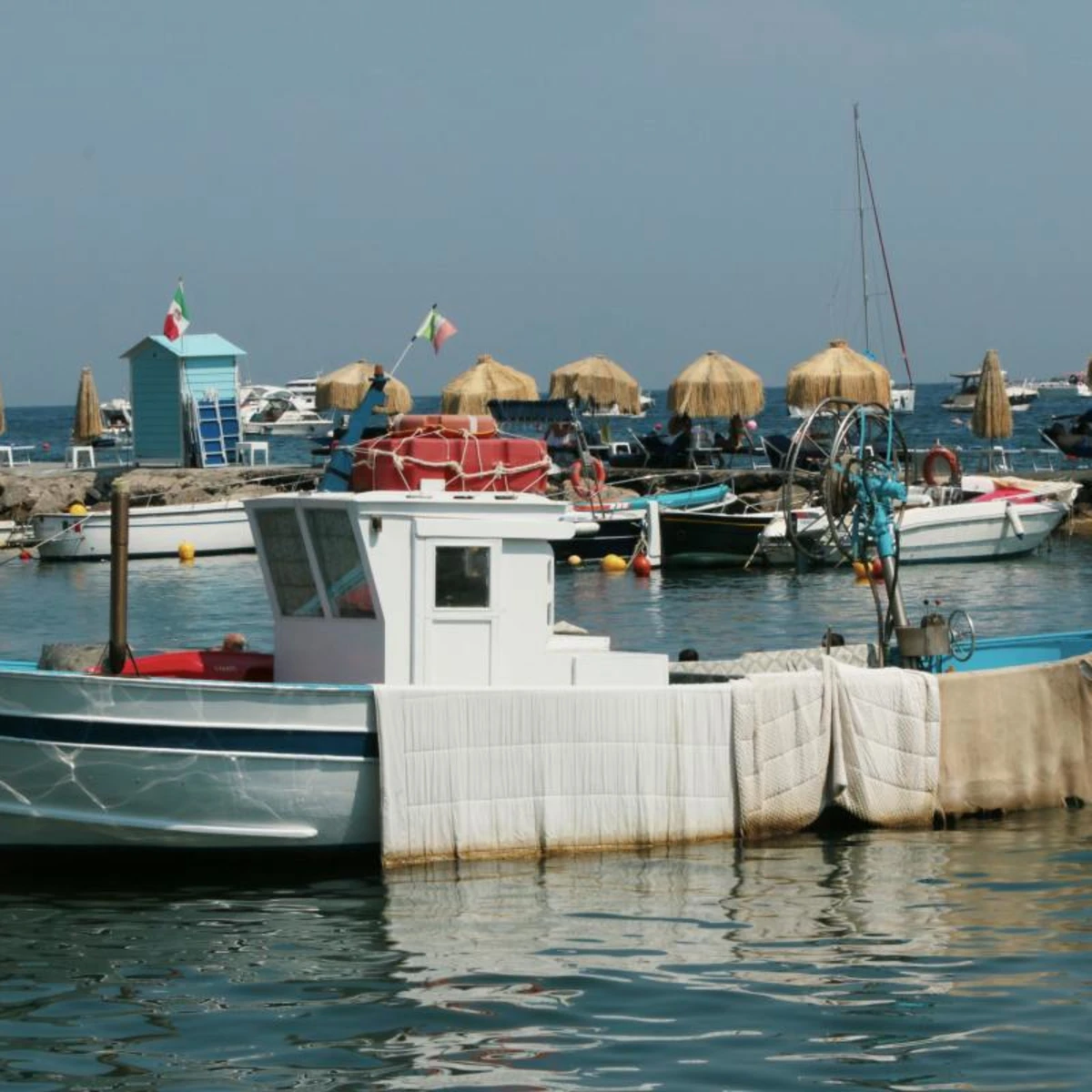 Fishermen's boats at bay by Ischia, an Italian island.