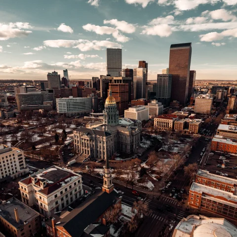 An aerial shot of the buildings of Denver, Colorado. 