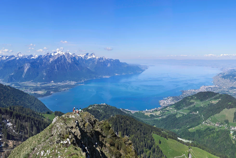 mountains overlooking a lake during daytime