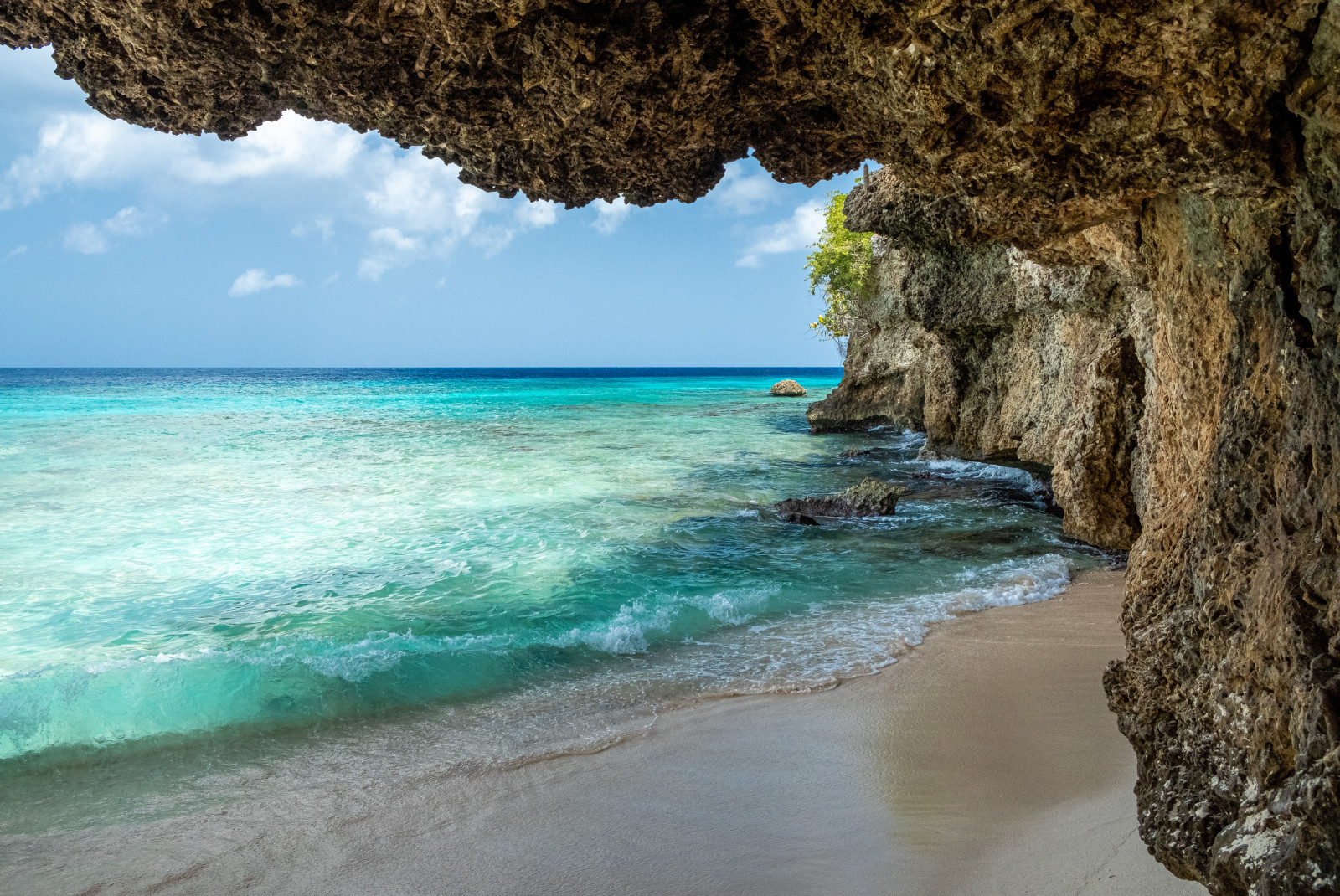 Cave with blue waters in Curacao