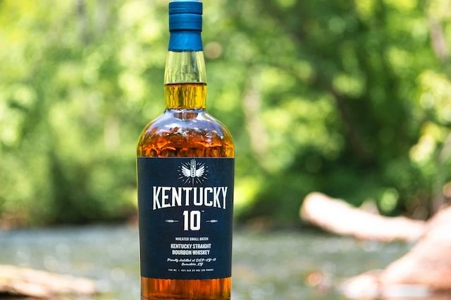 Kentucky whiskey bottle in nature.