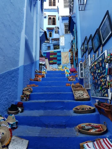Dark and light blue building with blue staircase in Morocco