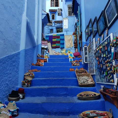 Dark and light blue building with blue staircase in Morocco