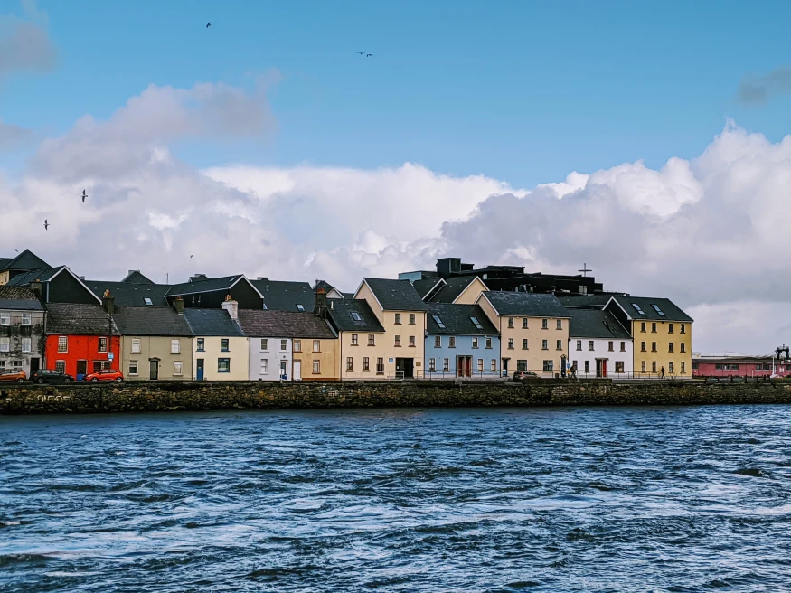 Houses lined up on the coast in Galway. 