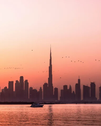 Dubai skyline during an orange sunset