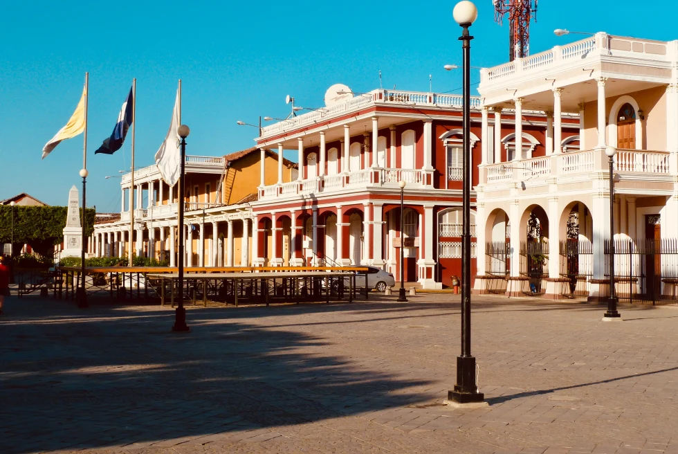 Colonial buildings and flags in Nicaragua.