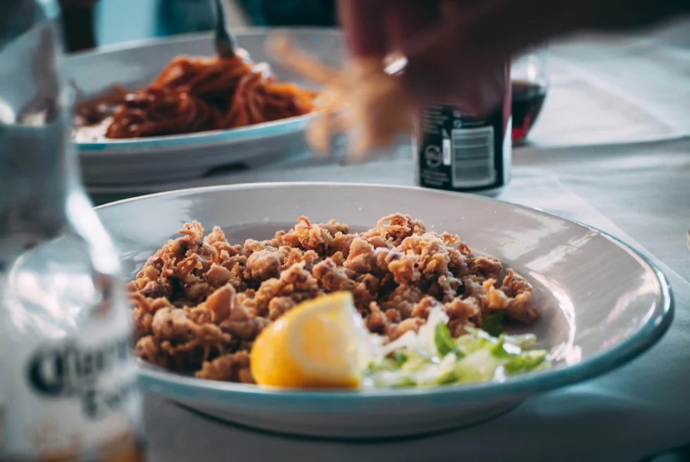 plate of fish with a lemon