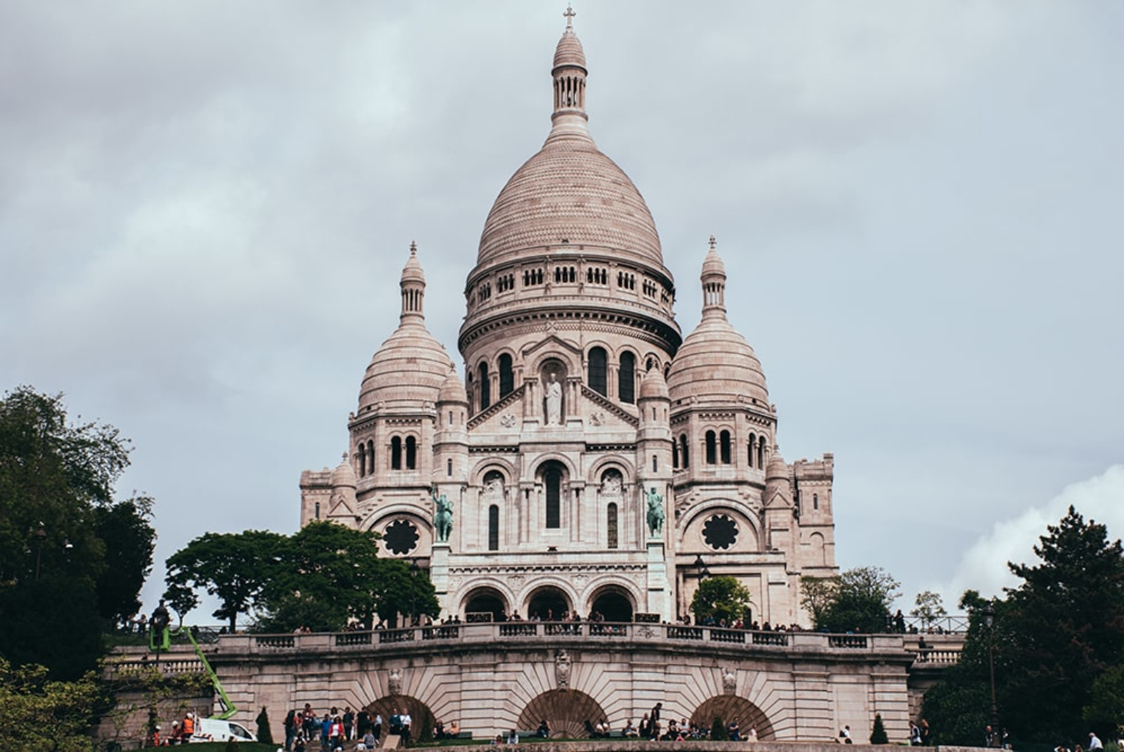 large domed building with cloudy skies