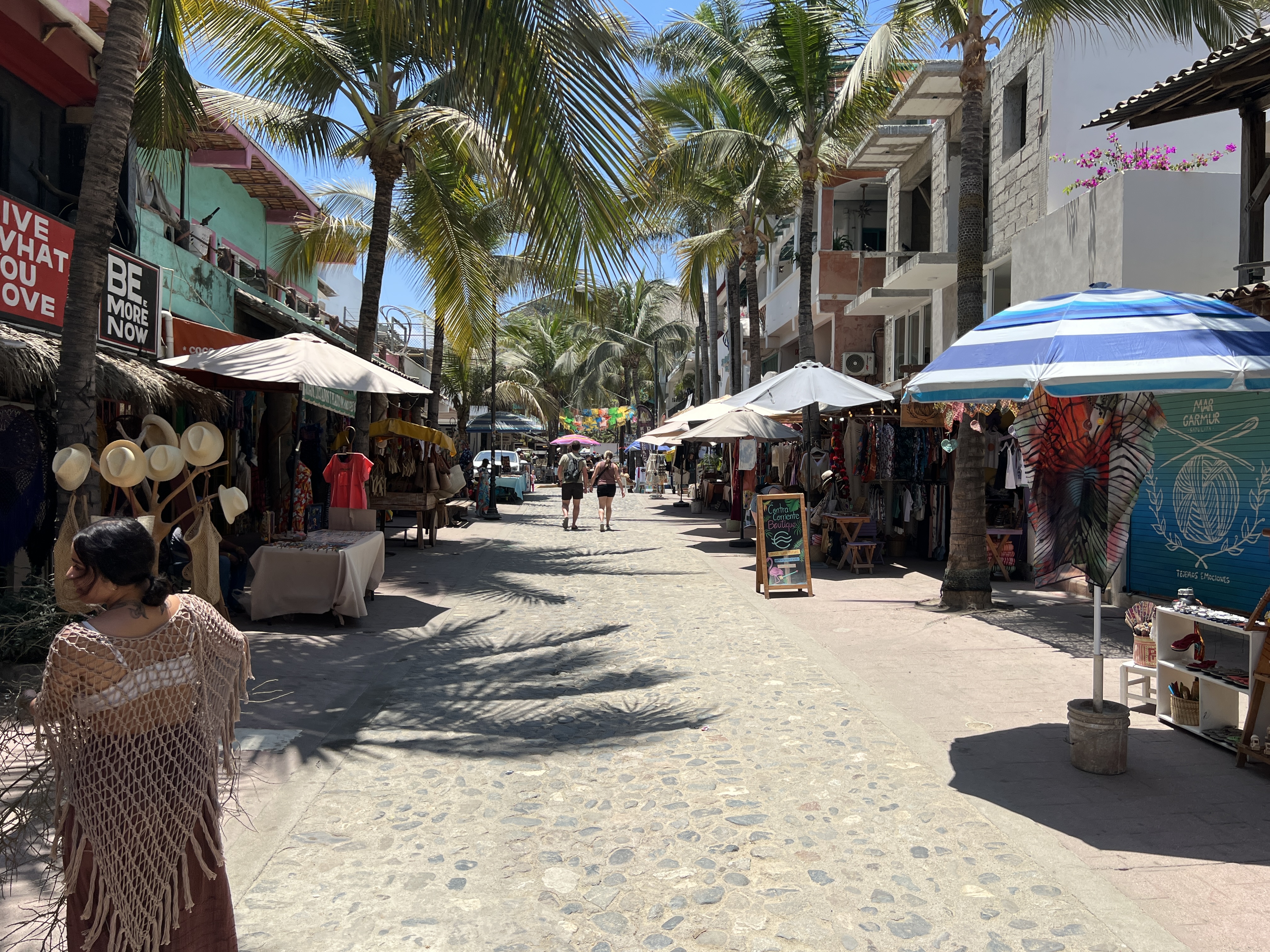 People walking down the street in Sayulita. 