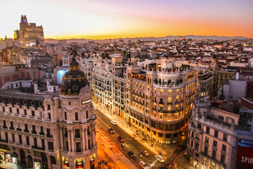 An aerial view of Gran Via, Madrid, at sunset.