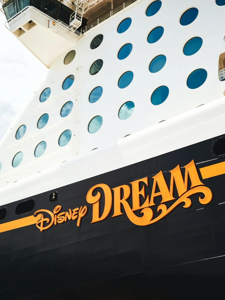 Name of Disney Cruise ship on dock before departure