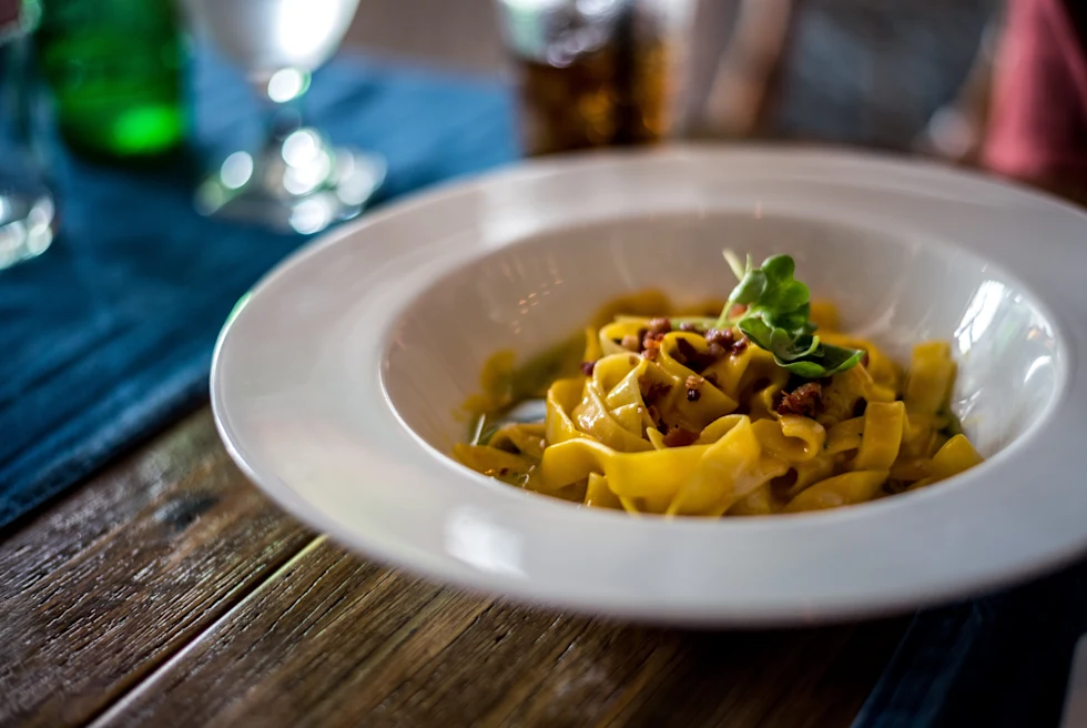 Pasta served on a plate.