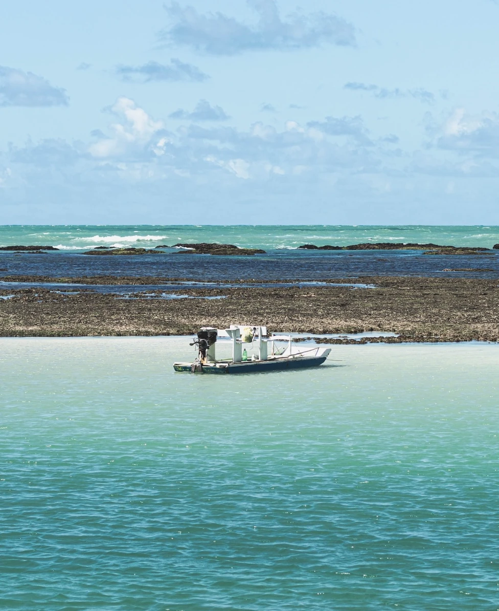 White boat in Antunes Beach, Maragogi - Alagoas.