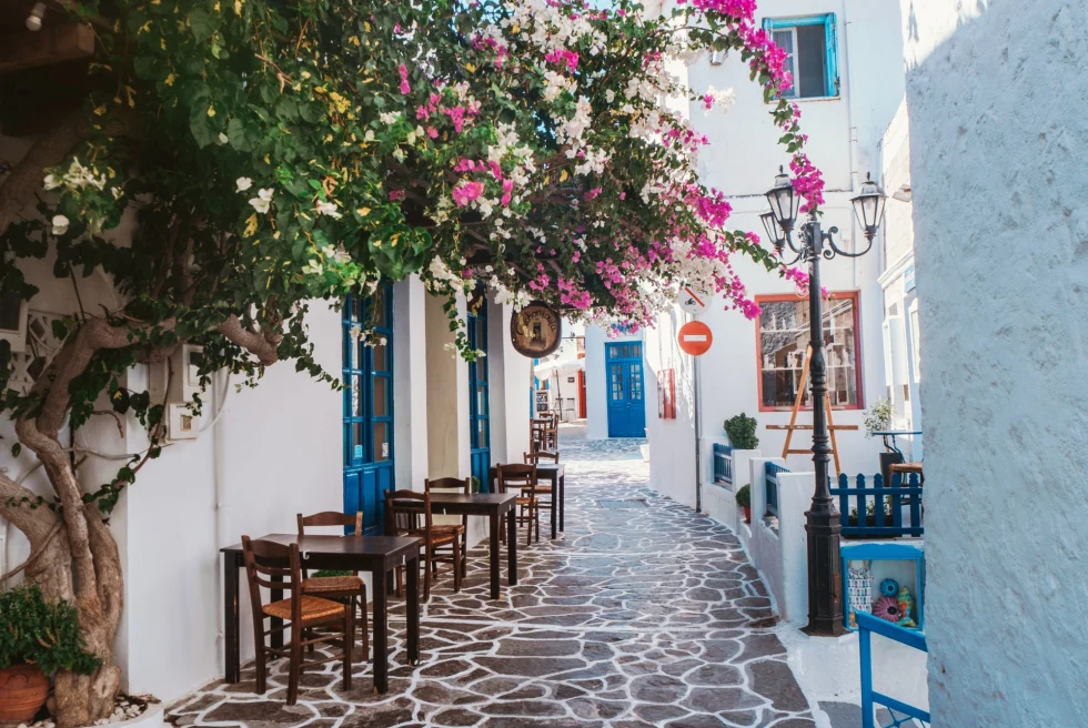 A street with outdoor sitting and brown white floor.