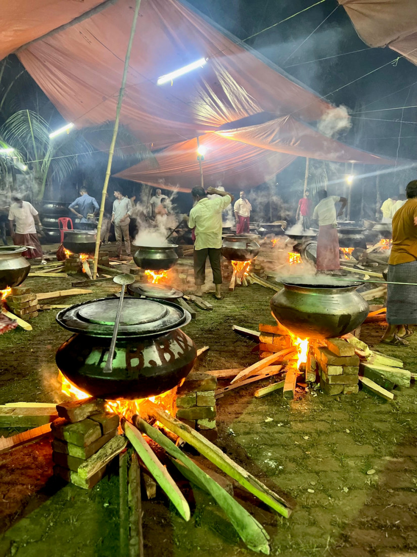 metal cauldrons of food outdoors