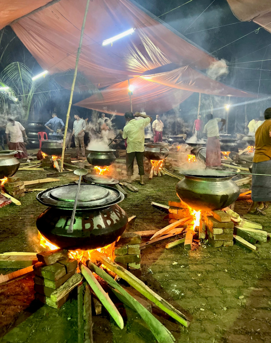 metal cauldrons of food outdoors