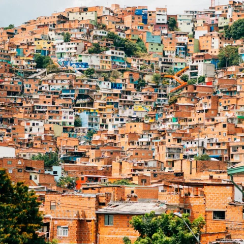 A hillside full of colorful houses.