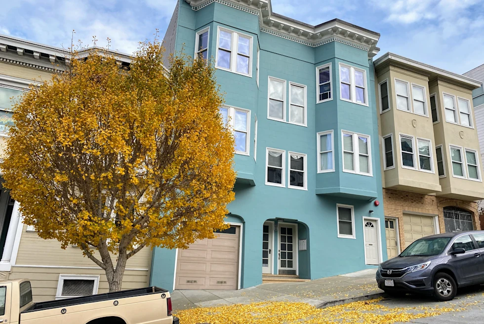 colorful houses on a hill during daytime