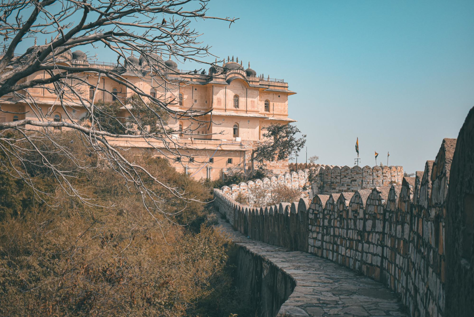 walkway and walls leading to Nahargarh Fort, a sought-out palace, in Jaipur.