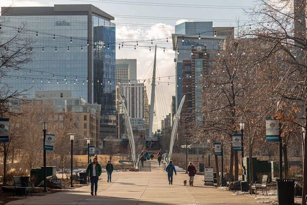 The city of downtown Denver and its bridge.