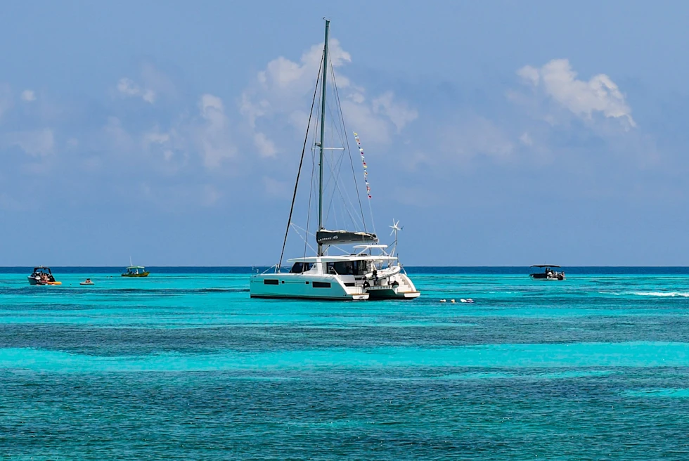 boat in the ocean during daytime