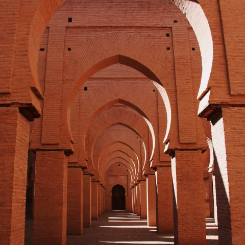 A series of brown concrete corridors outdoor during daytime