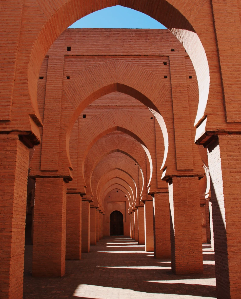 A series of brown concrete corridors outdoor during daytime