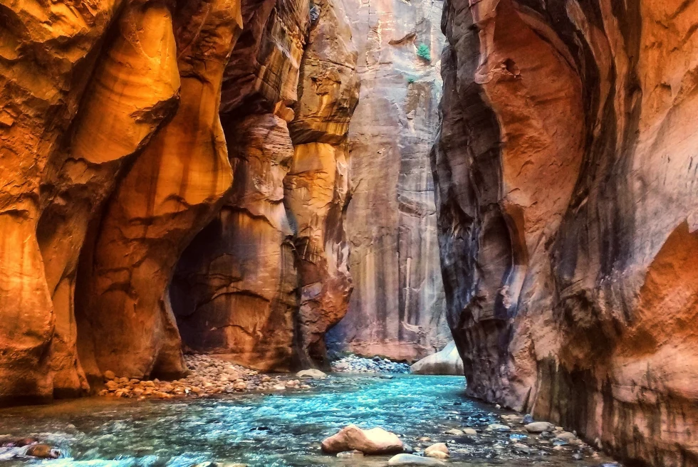Zion National Park narrow caves with pool of water